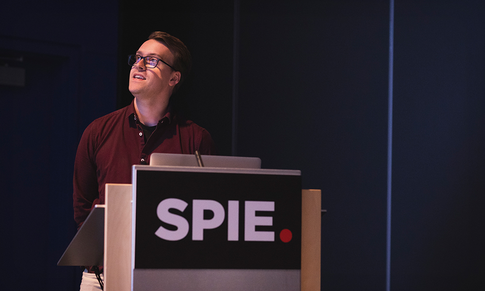 Woman presenting research at SPIE AR | VR | MR event