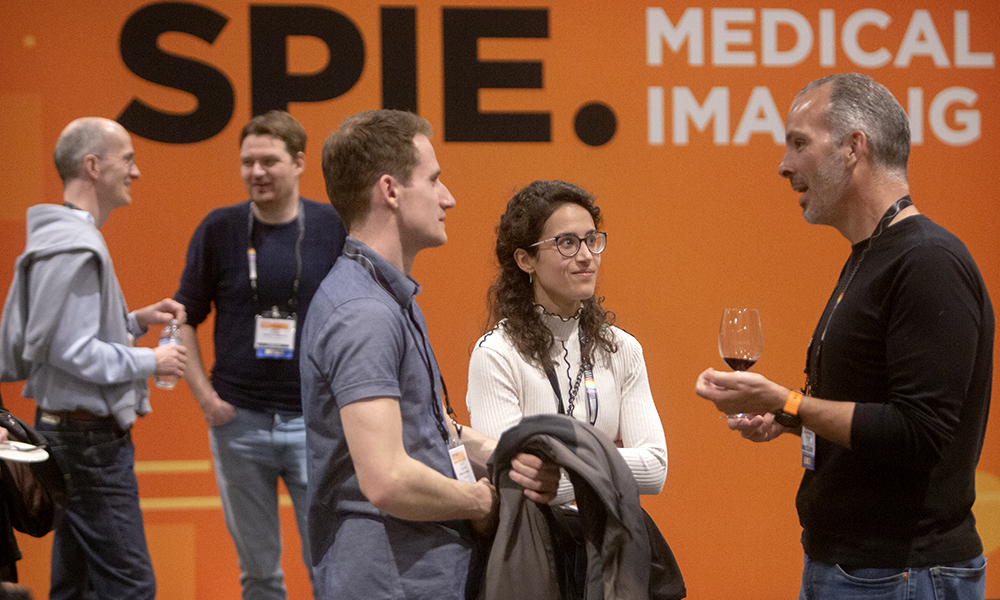 Attendees connecting with colleagues at SPIE Medical Imaging 