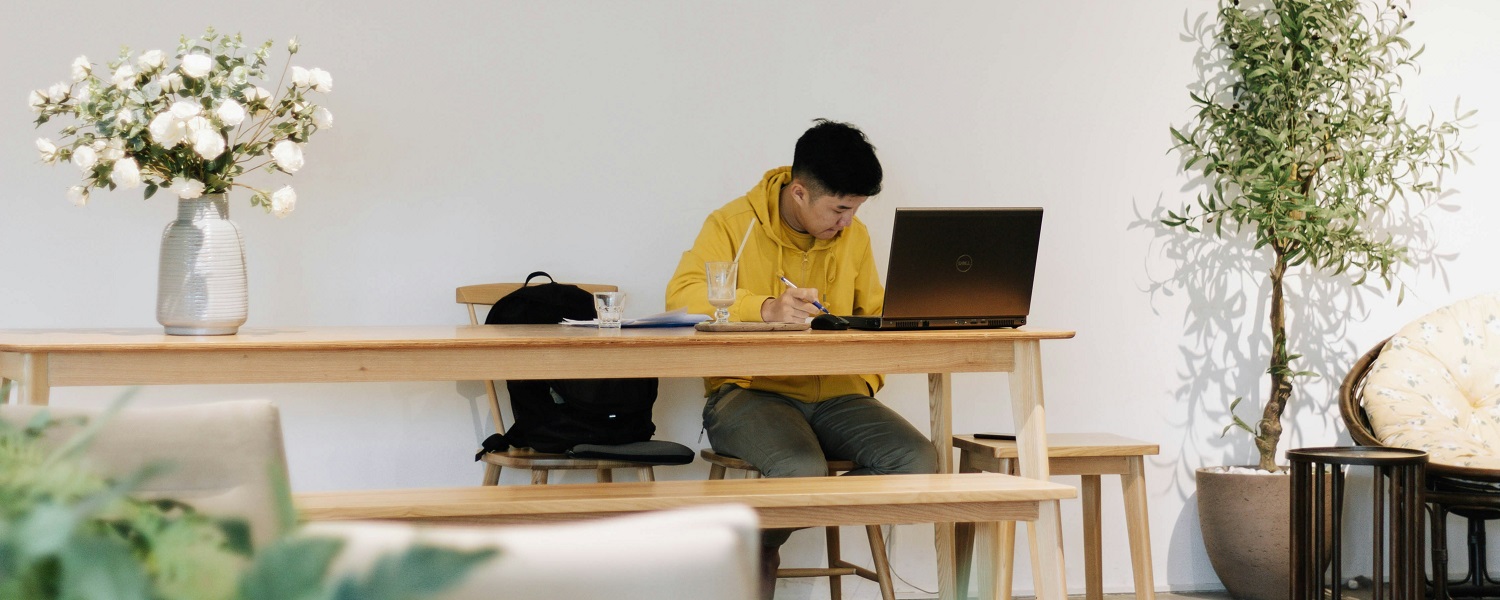 A man taking an SPIE online course from his home