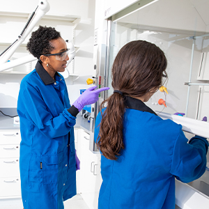 Women in Optics profile headshot: Loza Tadesse in lab