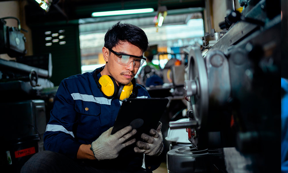 A photonics technician working in the field