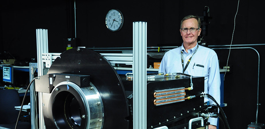 Thomas U. Kampe in the laboratory for polarization characterization of the Compact Hyperspectral Prism Spectrometer (CHPS).