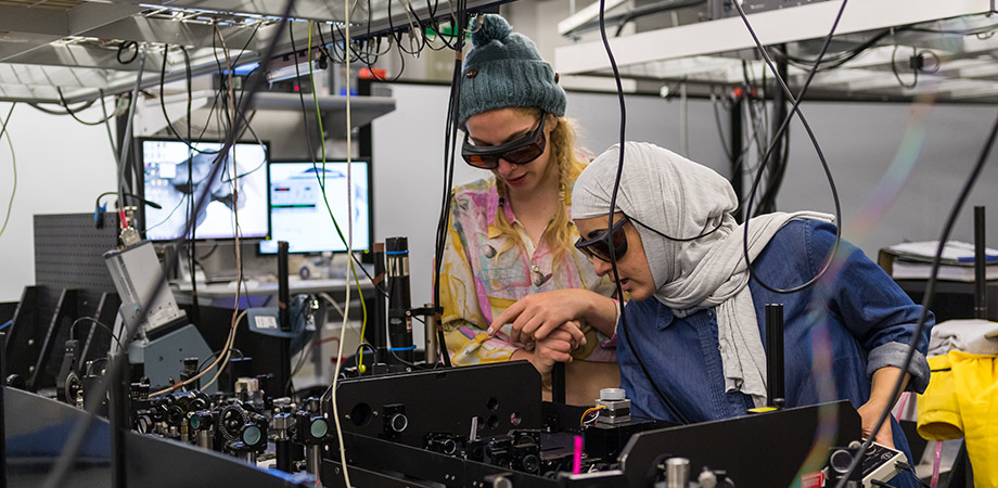 Doctoral students working in The University of Manchester's Photon Science Institute lab.