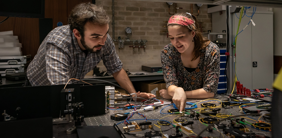 University of Birmingham students pictured in the UK Quantum Technology Hub, home to the SPIE Optics and Photonics Champion Academy.